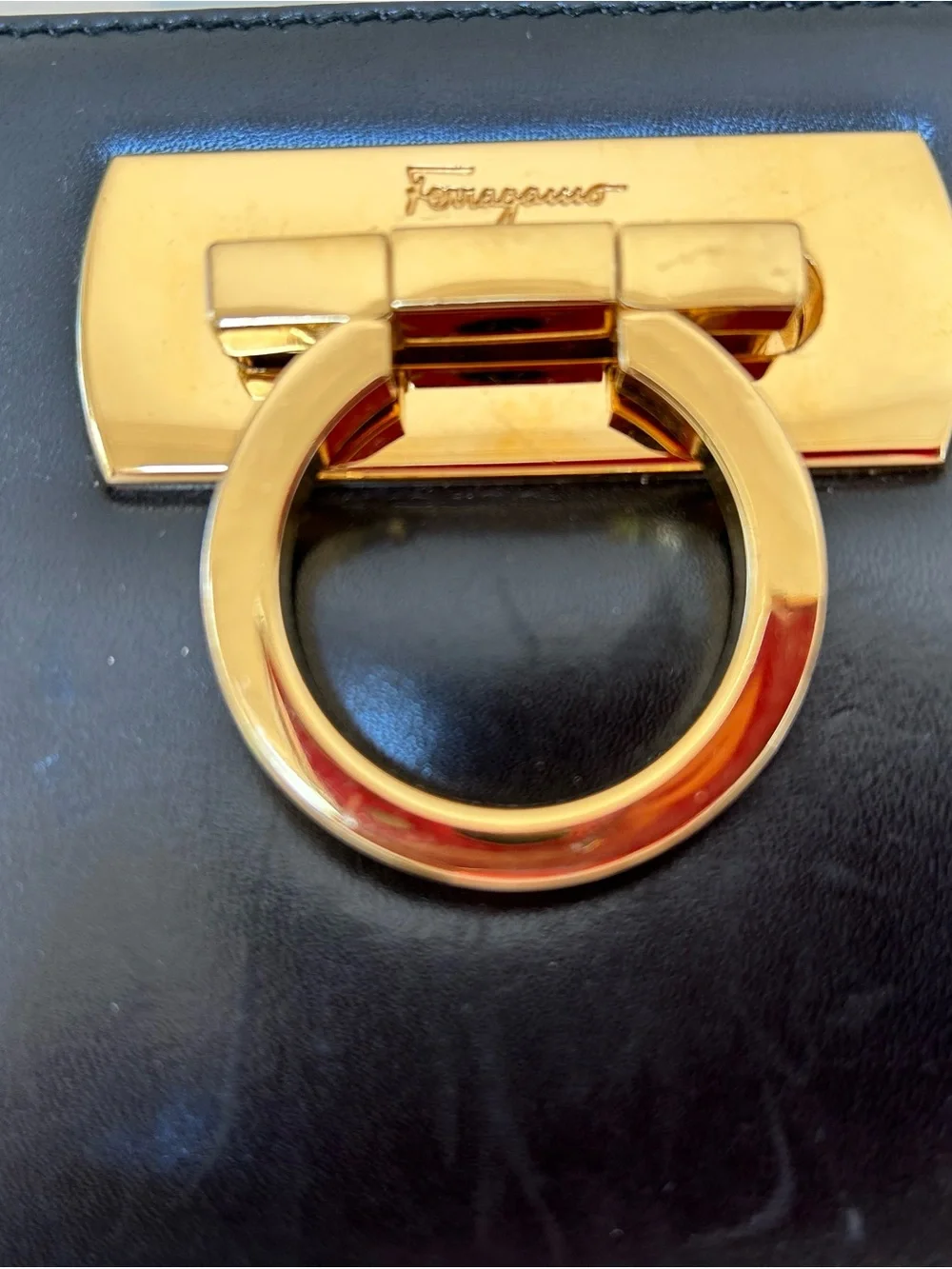 Salvatore Ferragamo Black Leather Clutch with Gold Ring Detail